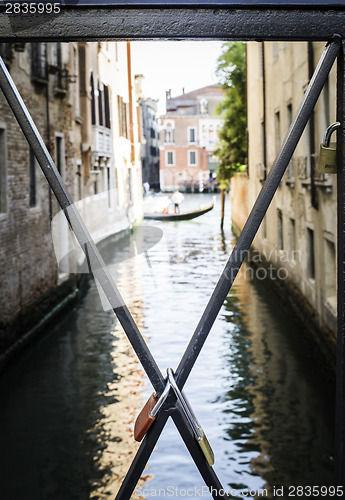 Image of Padlocks of lovers placed on the bridge