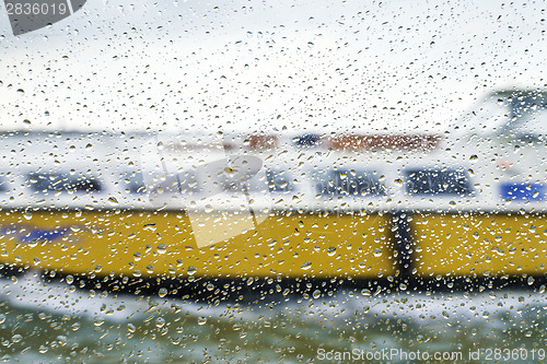 Image of Rain on glass ship