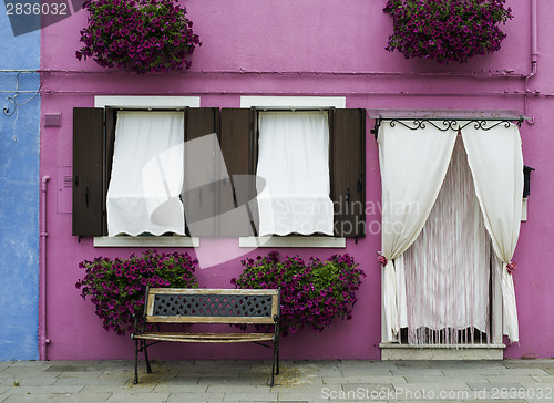 Image of Bright pink color house in Venice