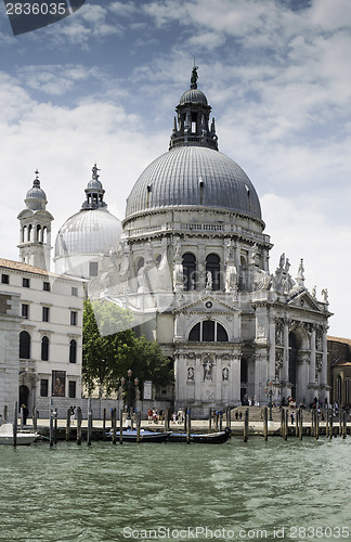 Image of Ancient buildings and boats in the channel in Venice