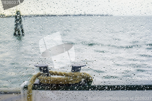 Image of Rain on glass ship