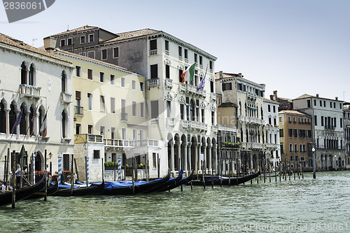 Image of Ancient buildings and boats in the channel in Venice