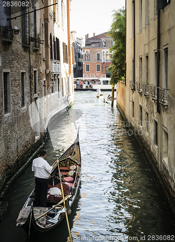Image of Man on a boat in Venice