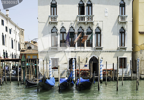 Image of Ancient buildings and boats in the channel in Venice