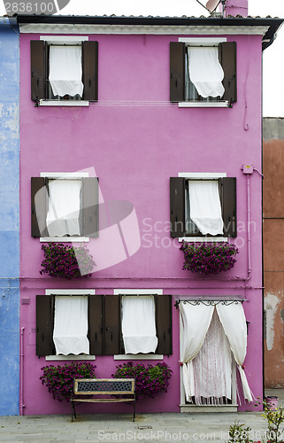 Image of Bright pink color house in Venice