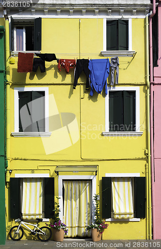 Image of Bright yellow color house in Venice