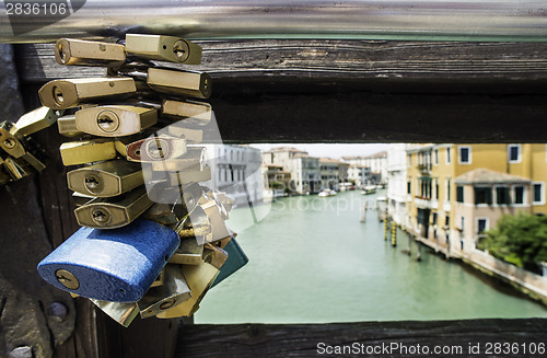 Image of Padlocks of lovers placed on the bridge