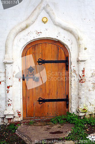 Image of Closed wooden door - Detail of old white church