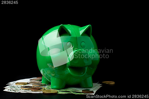 Image of Piggy Bank with LED bulb