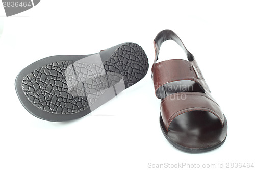 Image of brown flip-flops