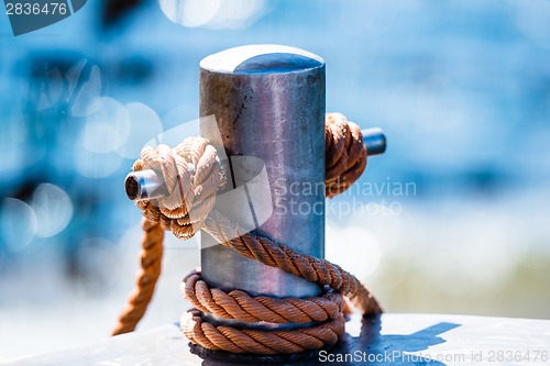 Image of Abstract: Bollard and rope