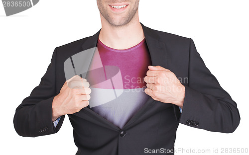 Image of Businessman opening suit to reveal shirt with flag