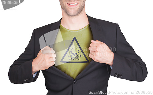 Image of Businessman opening suit to reveal shirt with sign