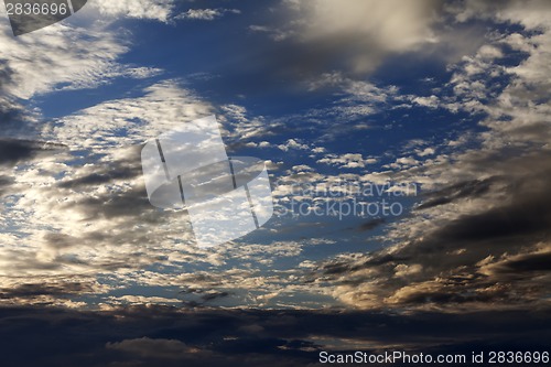 Image of Sky with clouds at summer sunset