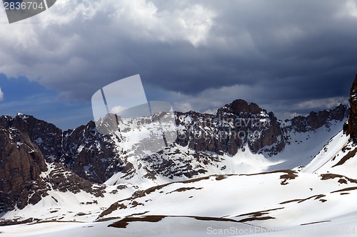 Image of Snow mountains and sky with clouds