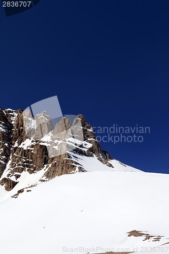 Image of Snowy mountains in nice spring day