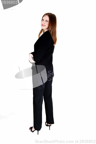 Image of Business woman standing.