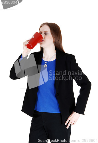 Image of Woman drinking coffee.