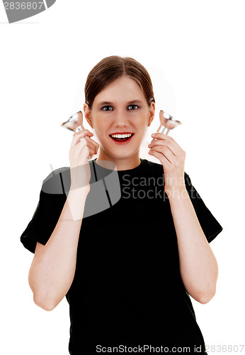 Image of Woman holding light bulb's.