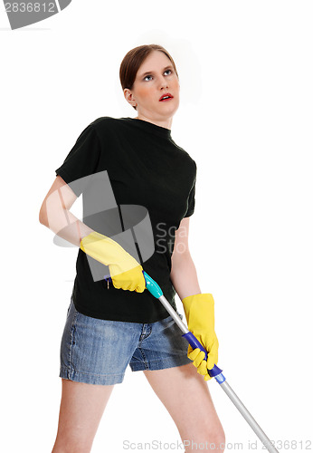 Image of Woman tired of cleaning.