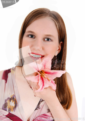 Image of Girl with pink lily.