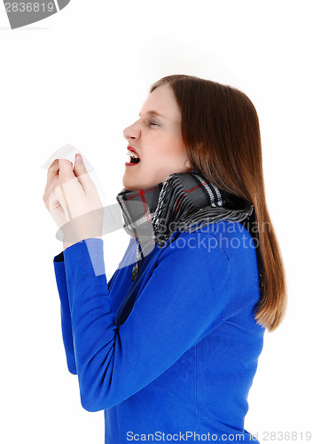 Image of Pretty girl sneezing.