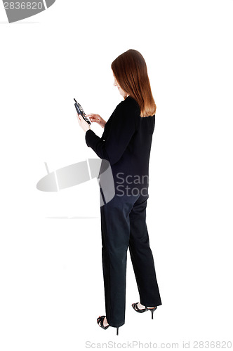 Image of Business woman on cell phone.
