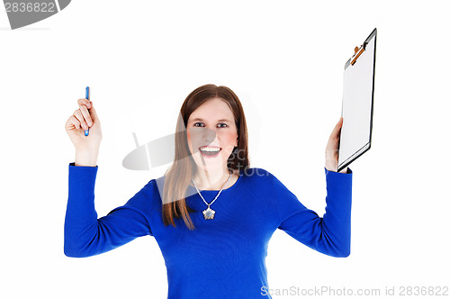 Image of Woman holding clip board.
