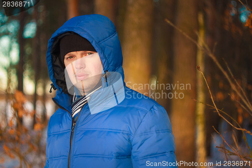 Image of Handsome Man In Winter Forest