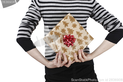 Image of Young woman holding a present