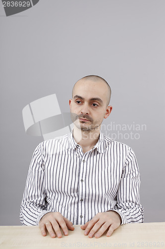 Image of Man at desk