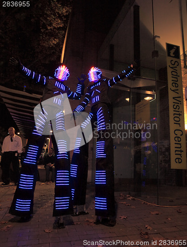 Image of Illuminated street performers,  stilt walkers for Sydney Vivid a