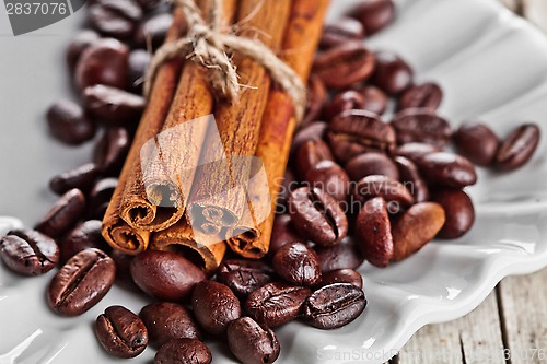 Image of cinnamon sticks and coffee beans