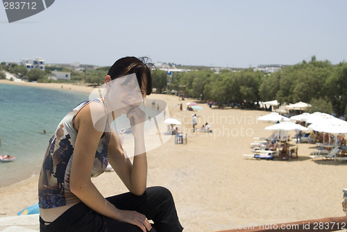 Image of attractive young woman beach
