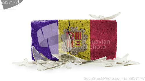 Image of Brick with broken glass, violence concept