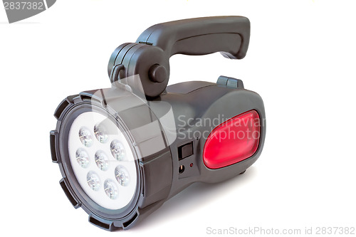 Image of Electric rechargeable led flashlight on a white background.