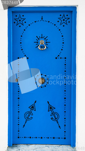 Image of Andalusian style Blue door from Sidi Bou Said