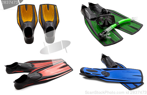 Image of Set of multicolored swim fins, mask, snorkel for diving with wat