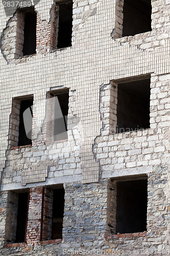 Image of Wall of old destroyed house with broken windows