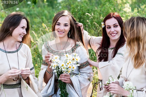 Image of Pretty women relaxing in forest