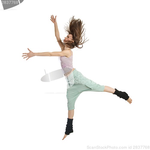 Image of Jumping young dancer isolated on white