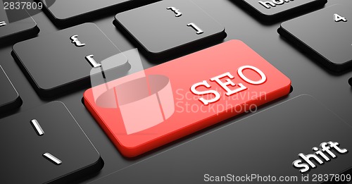 Image of SEO on Red Keyboard Button.