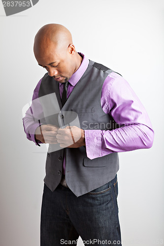 Image of Man Getting Dressed