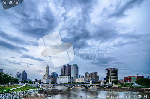 Image of Columbus, Ohio skyline reflected in the Scioto River. Columbus i