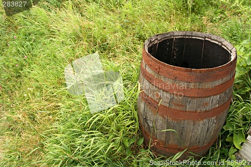 Image of Wooden barrel in grass