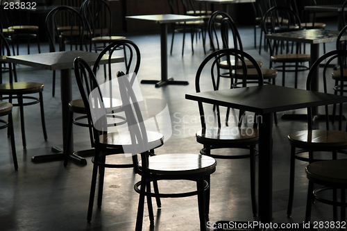 Image of Tables and chairs in a cafeteria