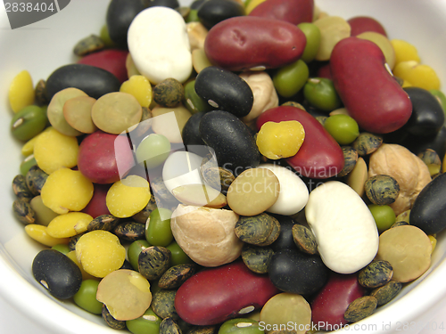 Image of A close-up view on mixed and colourful legumes in a bowl of chinaware