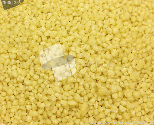 Image of A very close-up view on yellow couscous
