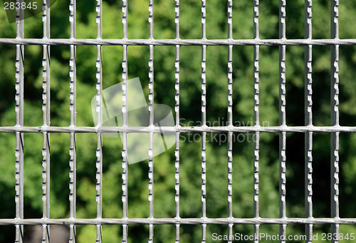 Image of Metal grid on blurry background