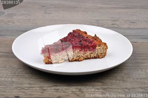 Image of Red currant cake on wood